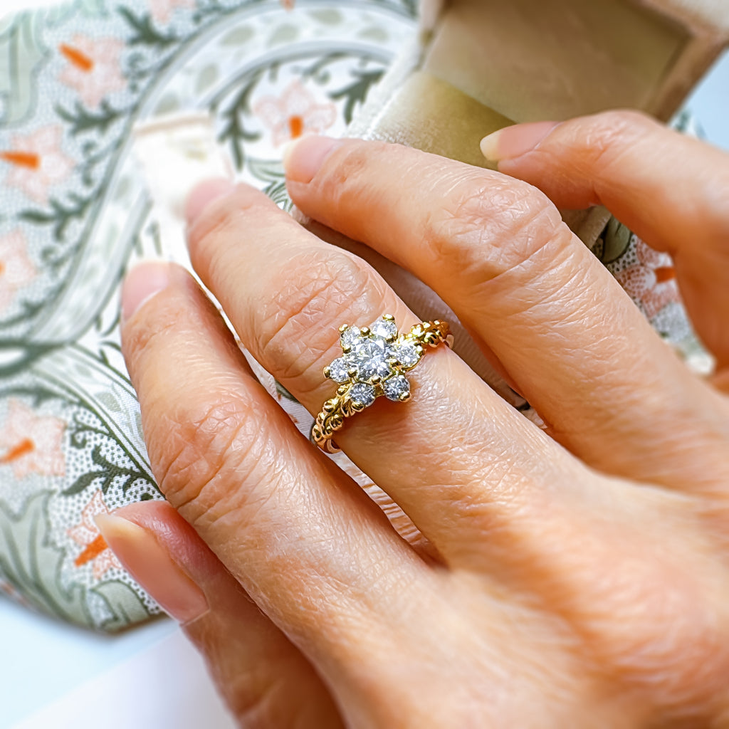 Vintage Princess Flower Diamond Cluster Engagement ring on a finger - Rings - Bijoux de Chagall